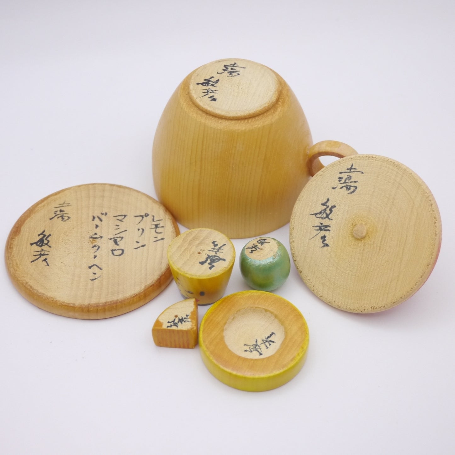 Kawaii Kokeshi doll by Kenichi Nishiyama Teacup in Lemon, Pudding, Baumkuchen, Marshmallow