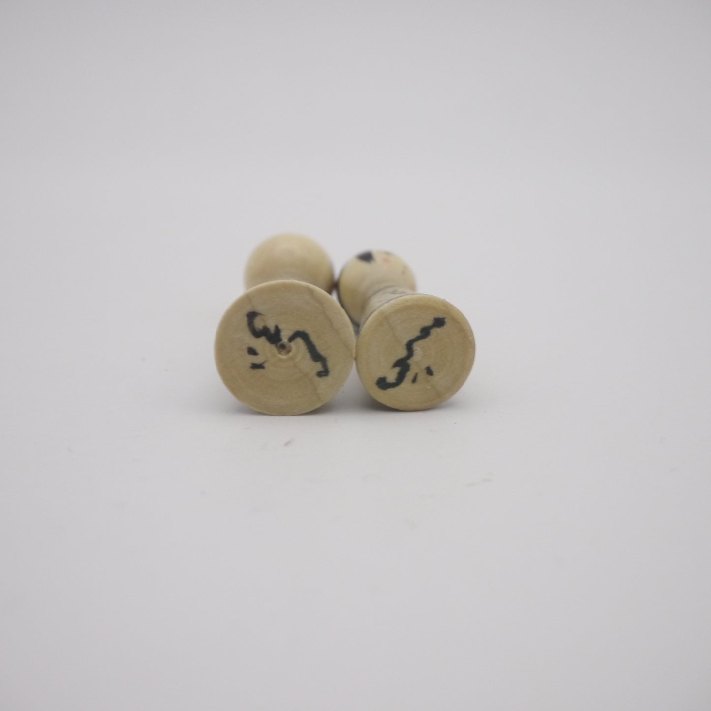 Tiny Kokeshi doll by Yoshinobu Kakizawa