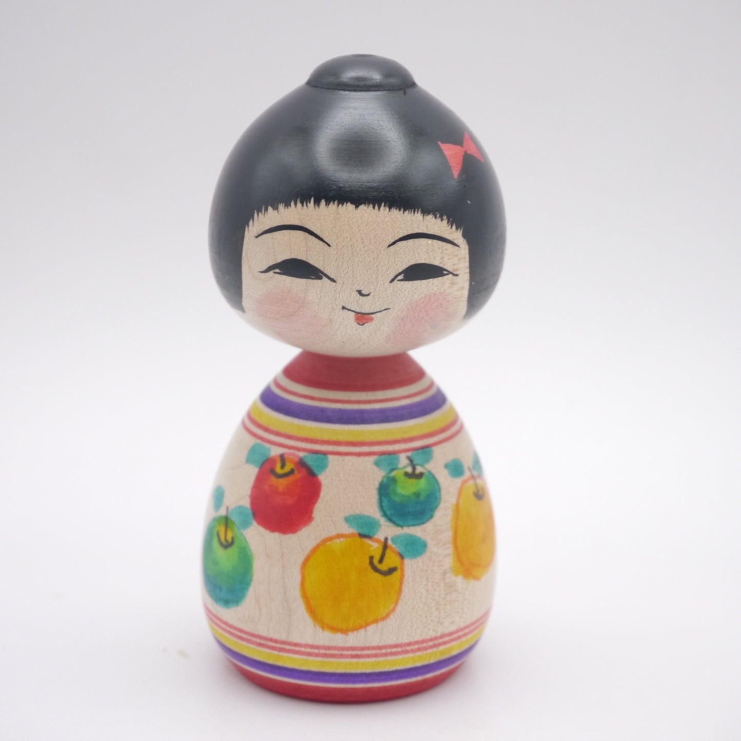 Kokeshi doll by Muchihide Abo Apple