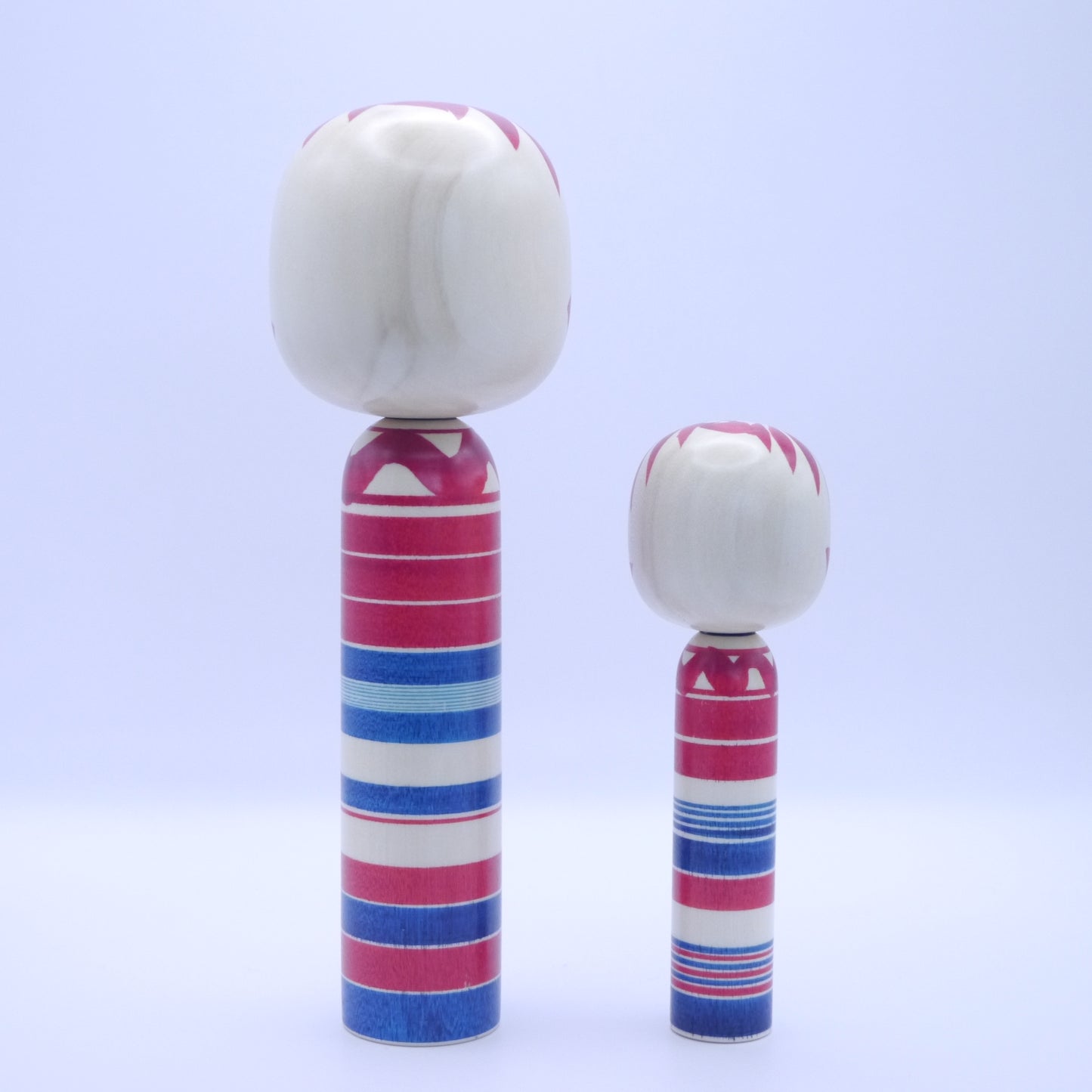 Kokeshi dolls by Yasuhiro Sato Set of 2 Red Blue