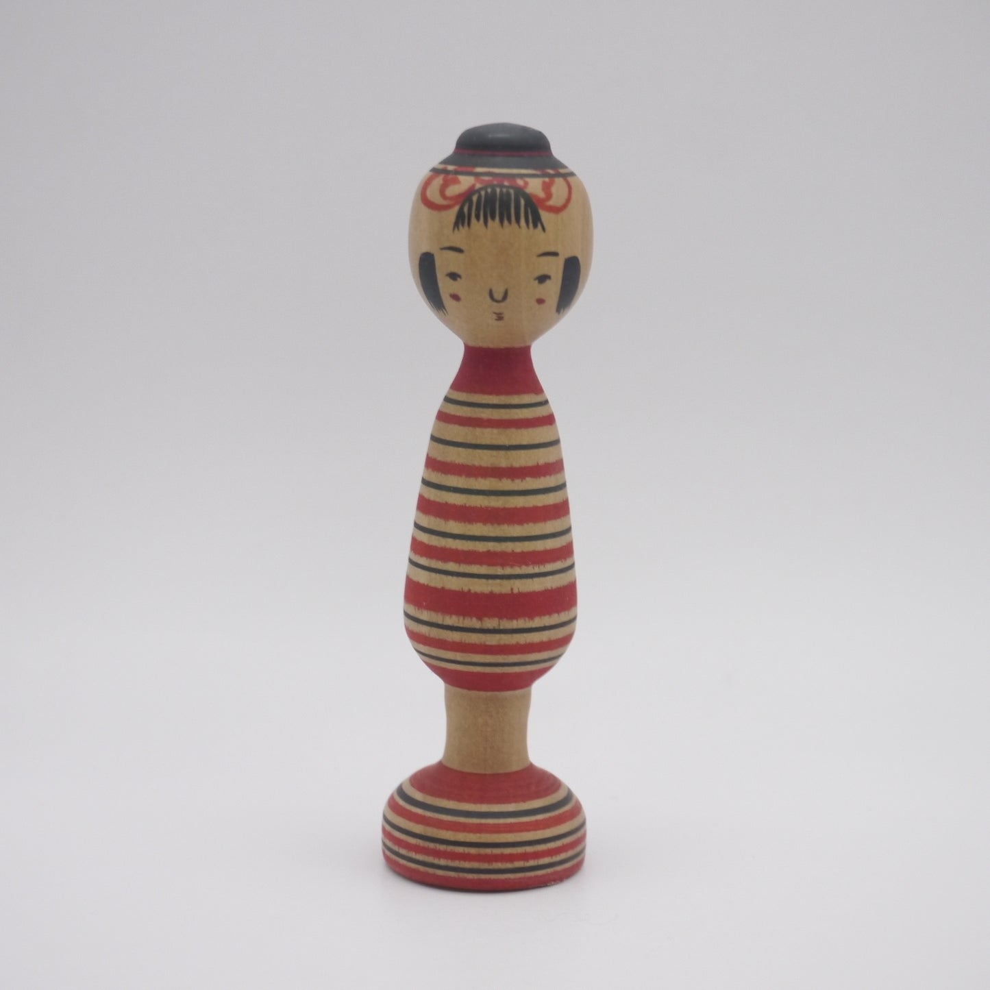 Kokeshi doll by Kunitoshi Abe