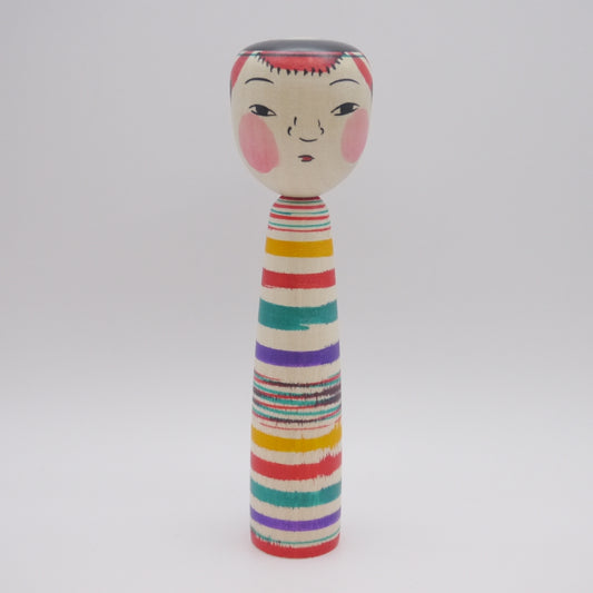 Kokeshi doll by Satoshi Noya Takobozu