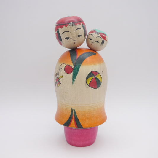 Kokeshi doll by Yoshinori Niiyama Babysitting