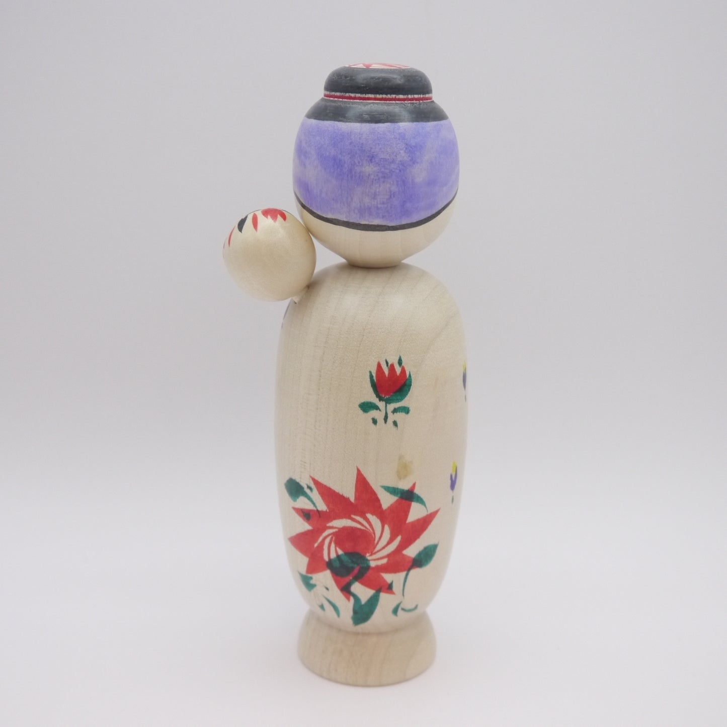 Kokeshi doll by Hideaki Onuma Babysitting