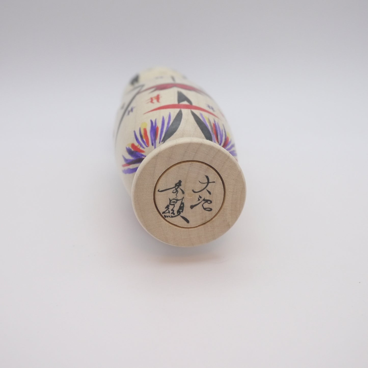 Kokeshi doll by Hideaki Onuma Babysitting