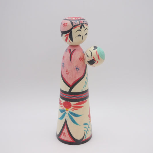 Kokeshi doll by Teruyuki Hiraga Babysitting