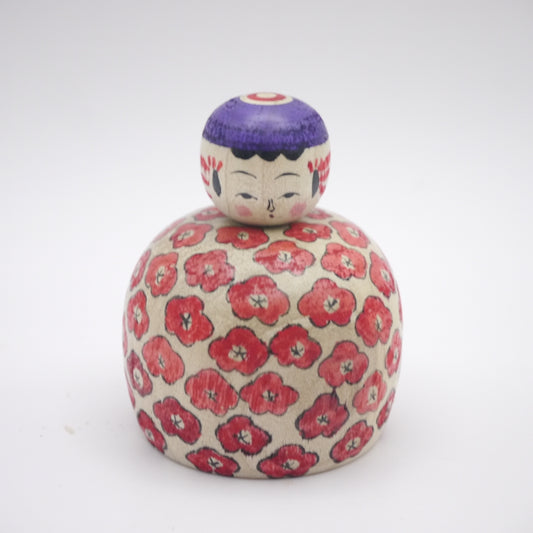 Kokeshi doll by Yuka Tomitsuka
