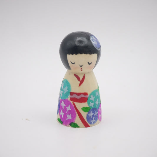 Kokeshi doll by Rika Komatsu