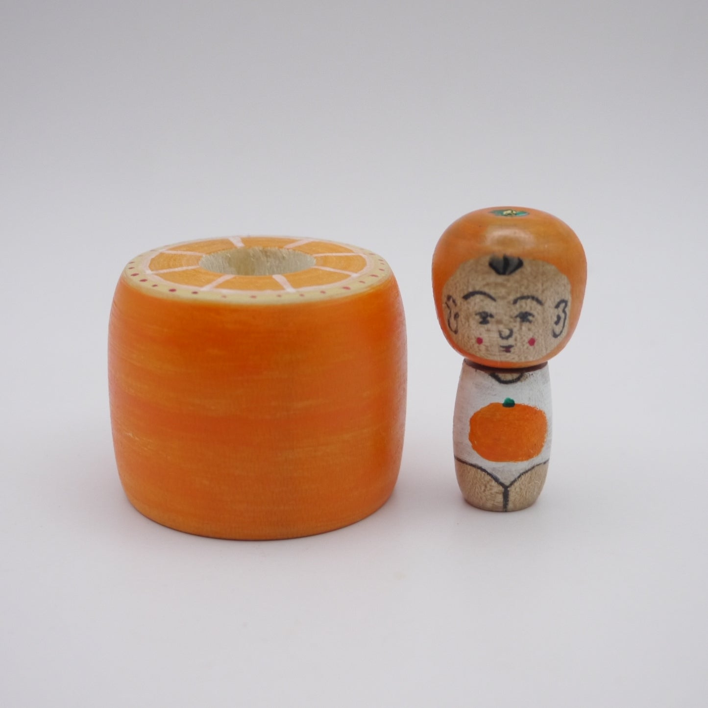 116 Kokeshi doll by Toshihiko Nishiyama Orange