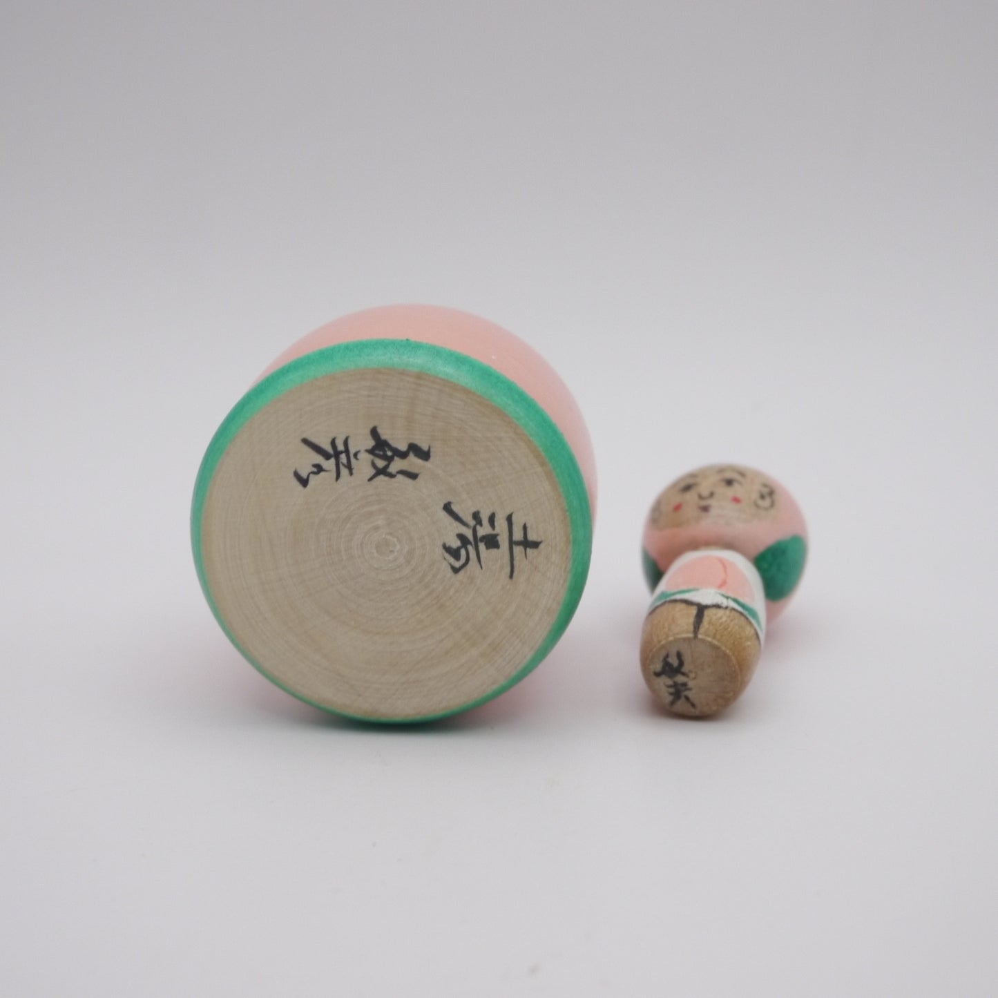 117 Kokeshi doll by Toshihiko Nishiyama Peach